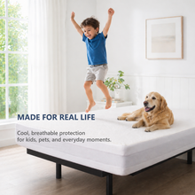 Load image into Gallery viewer, Child jumping on a mattress with a dog, in a bright room with large windows.
